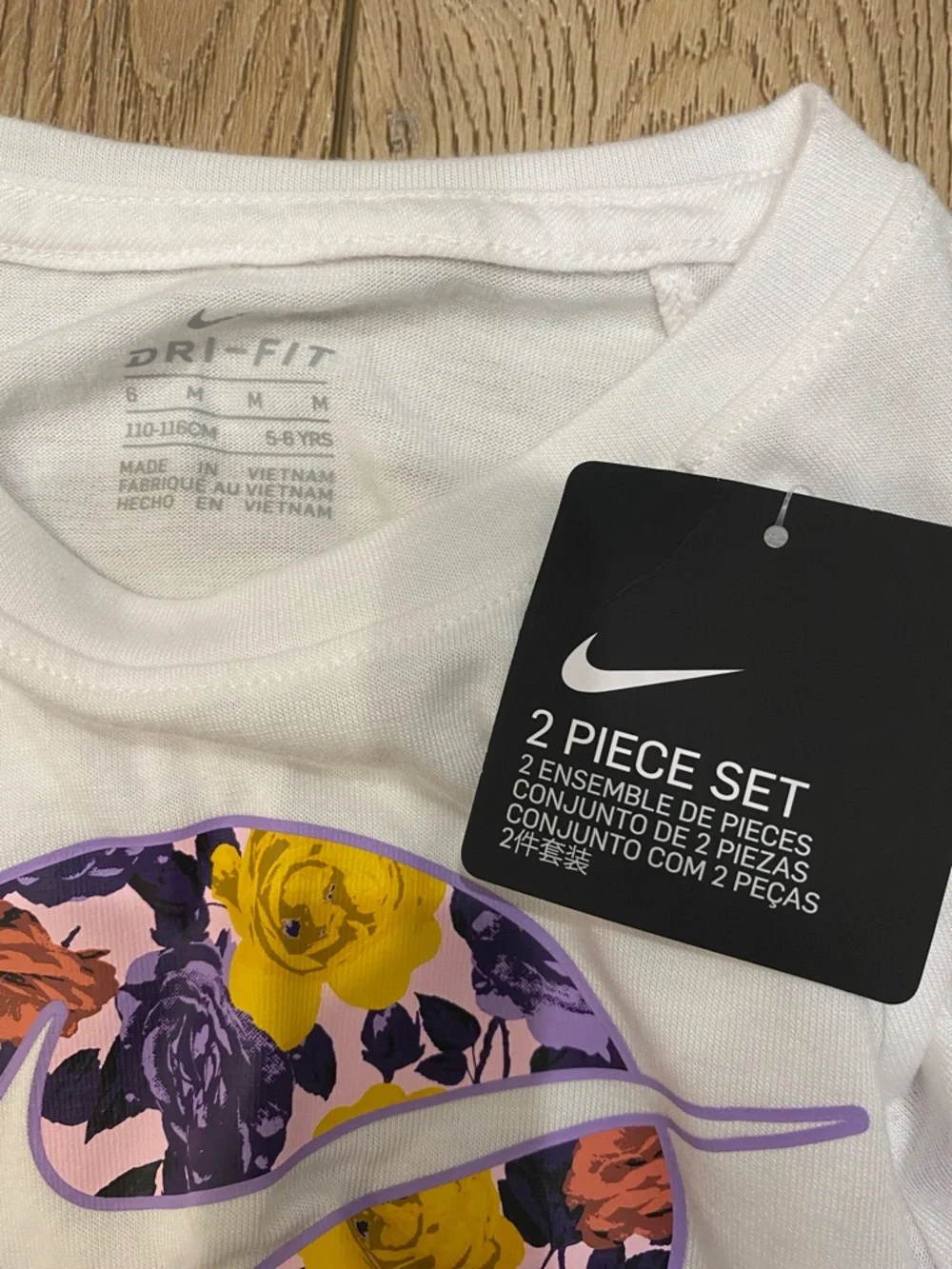 Nike White Tee & Purple-Yellow Floral Leggings Kids Set - Picture 4 of 4
